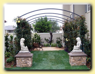 Rose arbor and statues 